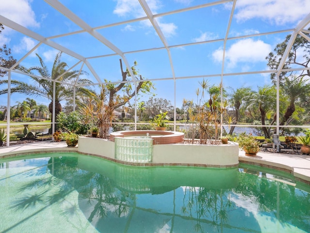 view of swimming pool featuring a patio, an in ground hot tub, and glass enclosure