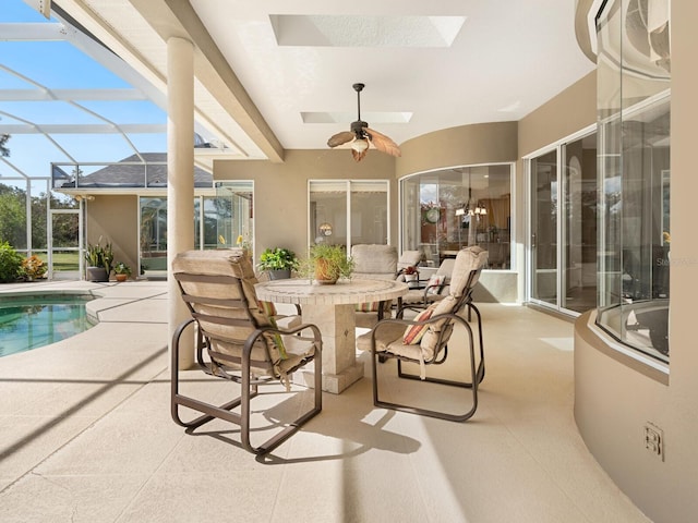 exterior space with a pool and ceiling fan