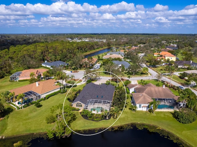 birds eye view of property featuring a water view