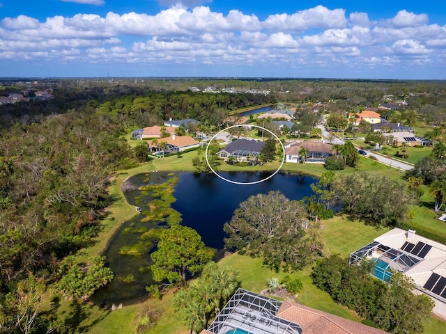 drone / aerial view with a water view