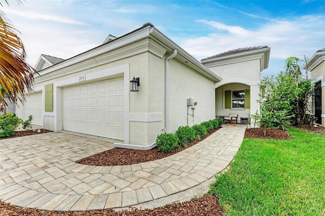 view of front of property with a garage