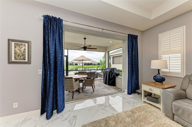 living room featuring ceiling fan