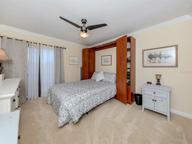 bedroom featuring ornamental molding, light carpet, and ceiling fan