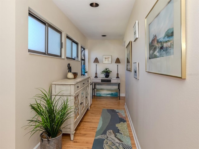 hallway featuring light hardwood / wood-style flooring