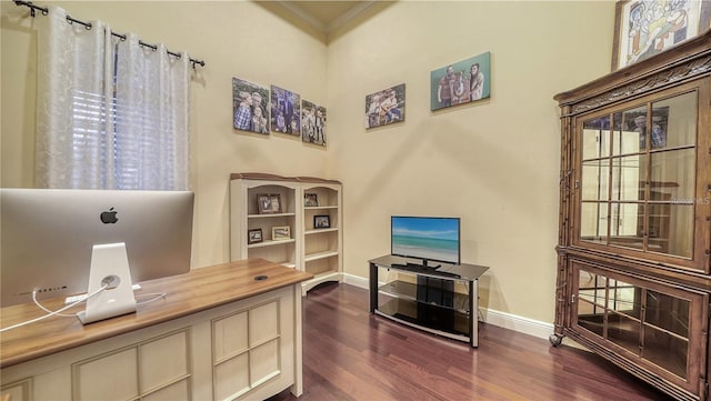 home office featuring crown molding and dark hardwood / wood-style floors