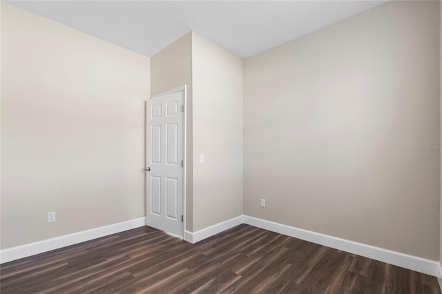 11332 Rivers Bluff Cir, Lakewood Ranch, FL 34202 - unfurnished room with baseboards and dark wood-type flooring