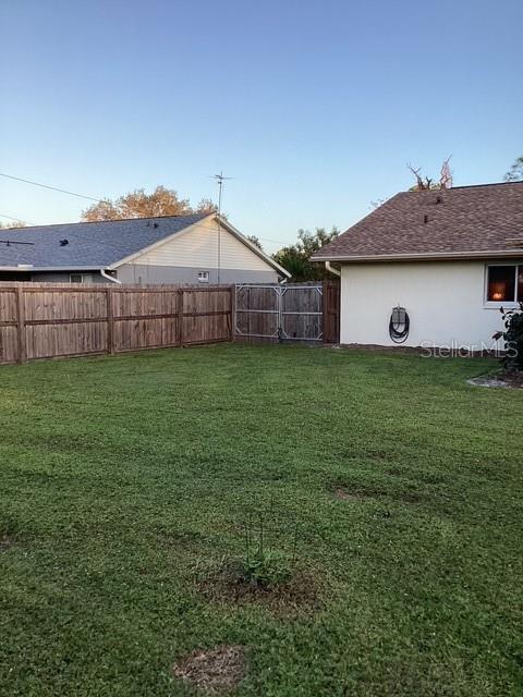 4601 Ulster Ave, North Port, FL 34287 - view of yard featuring fence