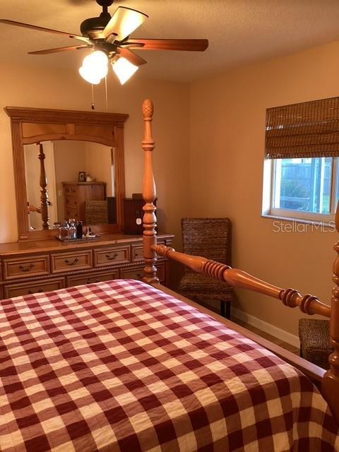 4601 Ulster Ave, North Port, FL 34287 - bedroom featuring ceiling fan
