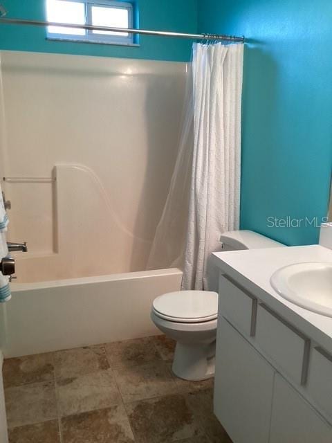 4601 Ulster Ave, North Port, FL 34287 - full bathroom with shower / tub combo with curtain, vanity, and toilet