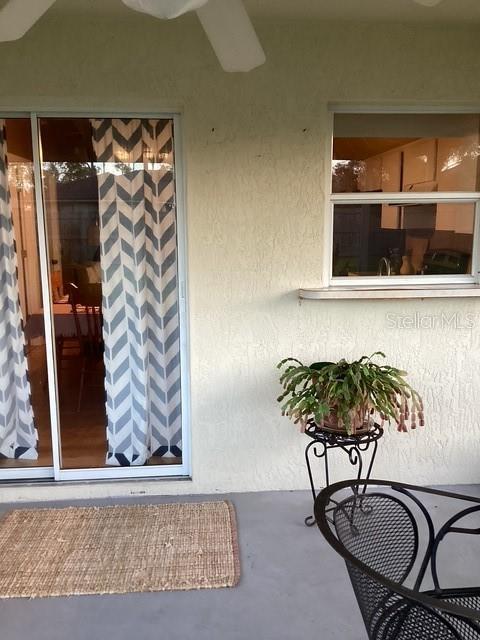 4601 Ulster Ave, North Port, FL 34287 - property entrance featuring stucco siding