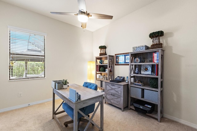 carpeted office with ceiling fan