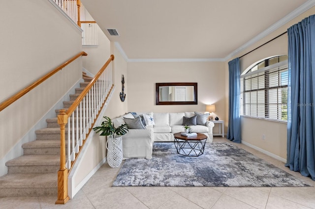 living room featuring crown molding and light tile patterned floors