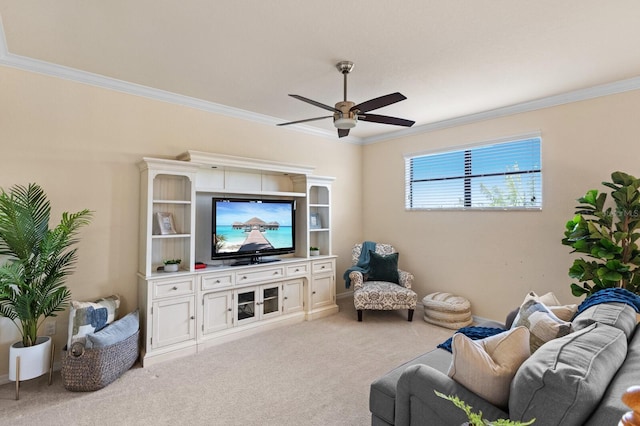 living room featuring crown molding, ceiling fan, and light carpet