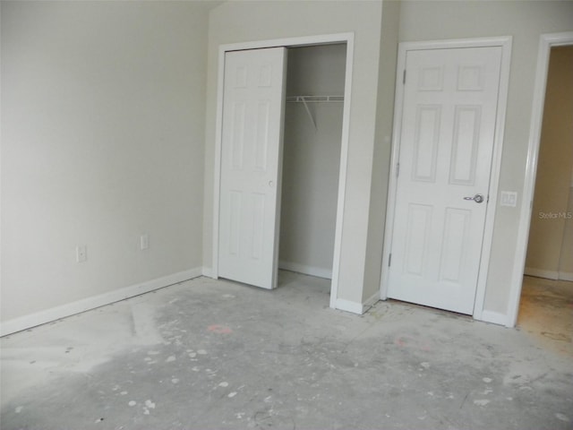 unfurnished bedroom with a closet