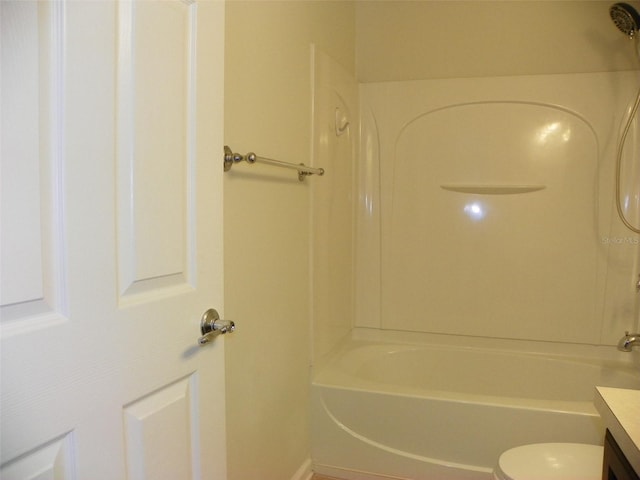 full bathroom with vanity, toilet, and shower / washtub combination