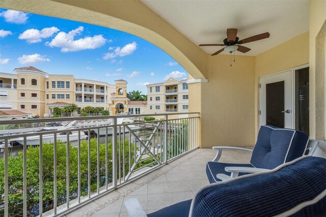 14041 Bellagio Way Unit 214, Osprey, FL 34229 - balcony featuring a ceiling fan