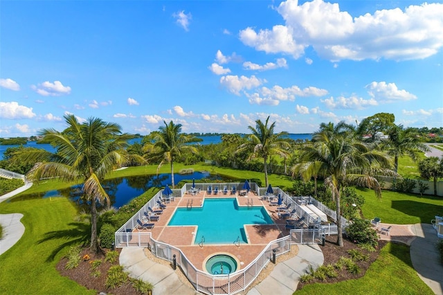 14041 Bellagio Way Unit 214, Osprey, FL 34229 - community pool with a lawn, a water view, a community hot tub, and fence