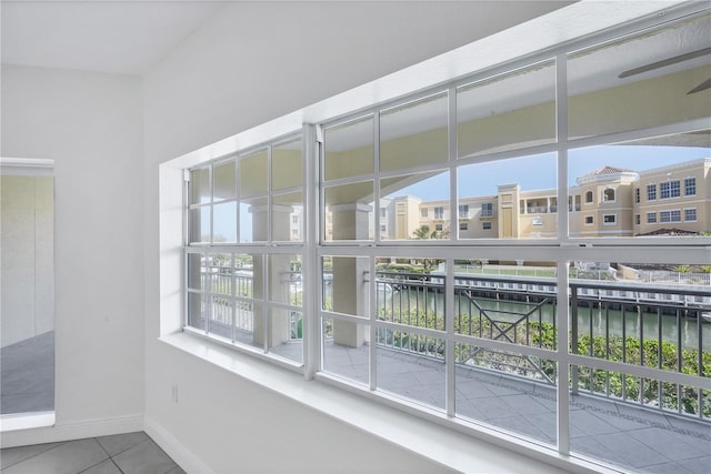 14041 Bellagio Way Unit 214, Osprey, FL 34229 - interior space featuring a water view and baseboards