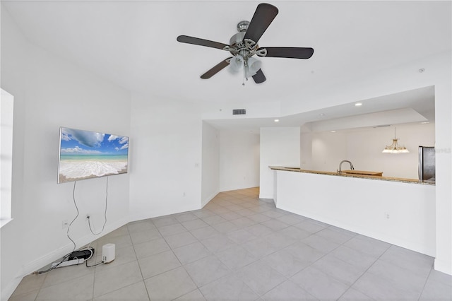 14041 Bellagio Way Unit 214, Osprey, FL 34229 - unfurnished living room featuring tile patterned flooring, ceiling fan, recessed lighting, and visible vents