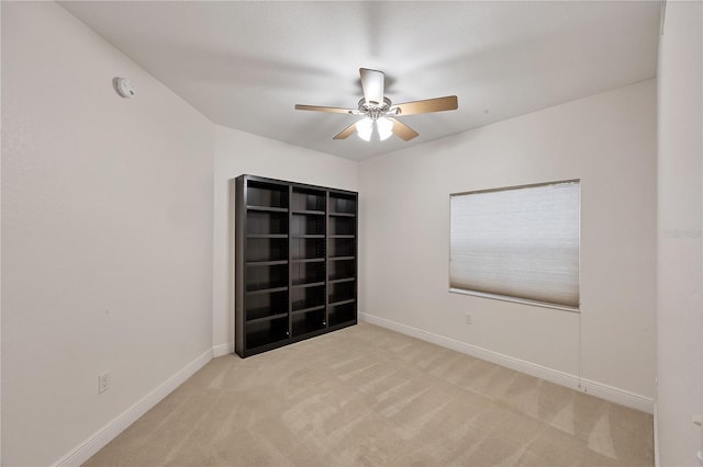 14041 Bellagio Way Unit 214, Osprey, FL 34229 - carpeted empty room featuring baseboards and a ceiling fan