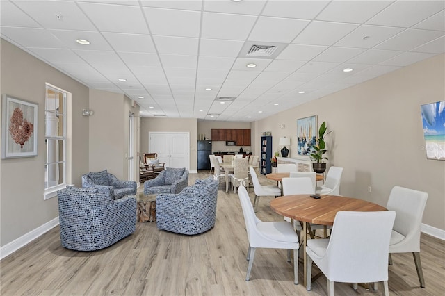 14041 Bellagio Way Unit 214, Osprey, FL 34229 - dining space featuring baseboards, recessed lighting, light wood-style flooring, and visible vents