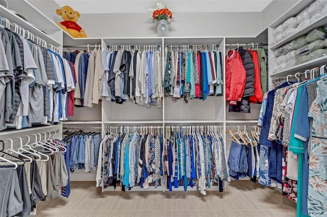 walk in closet featuring tile patterned floors