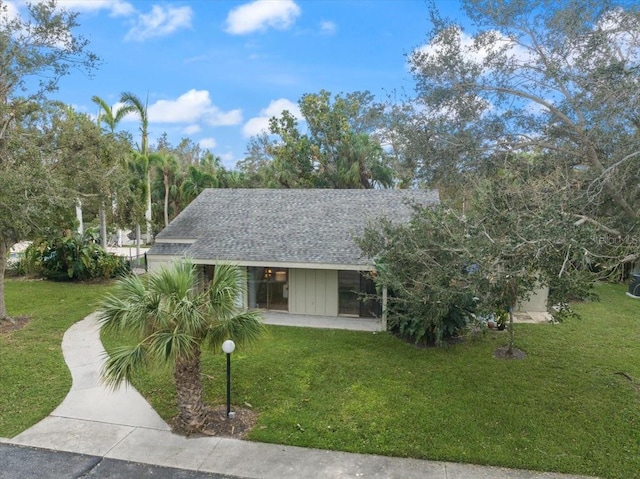 view of front of home with a front lawn