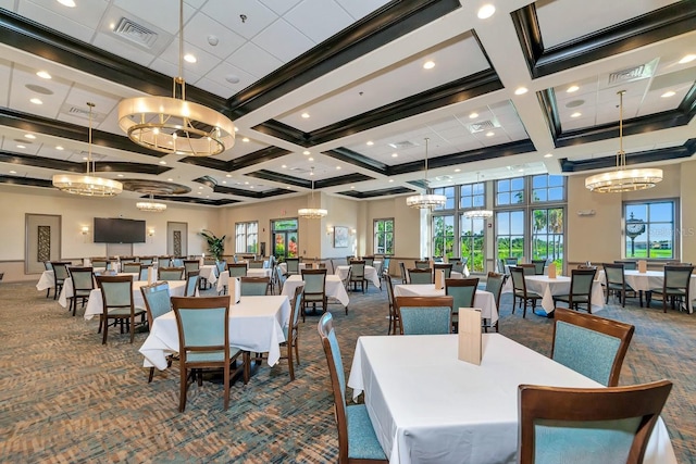 carpeted dining room with a towering ceiling, beam ceiling, and coffered ceiling