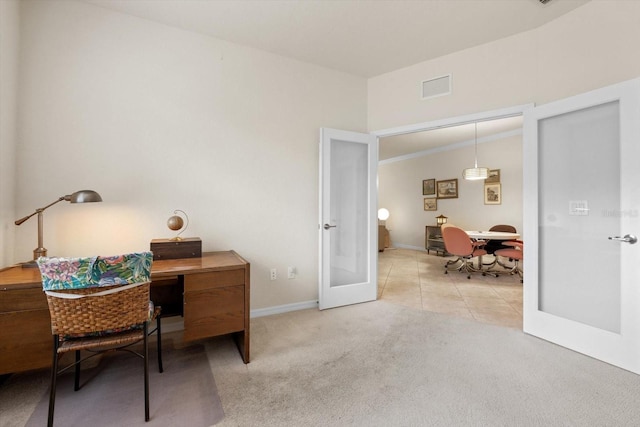 carpeted office space with french doors and ornamental molding