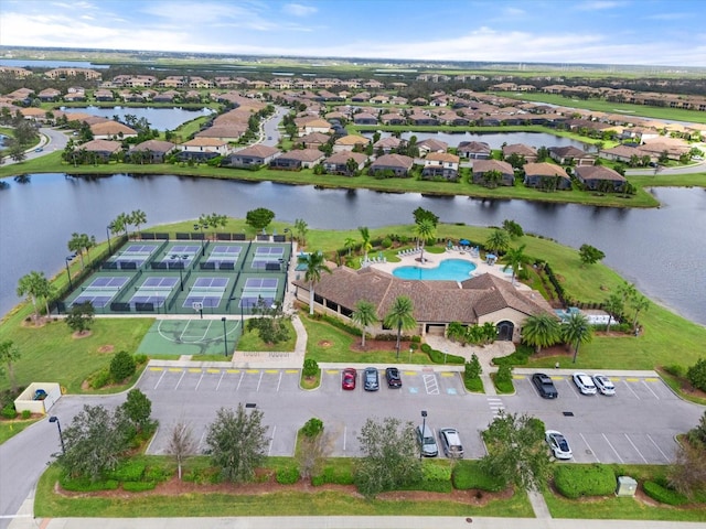 drone / aerial view with a water view