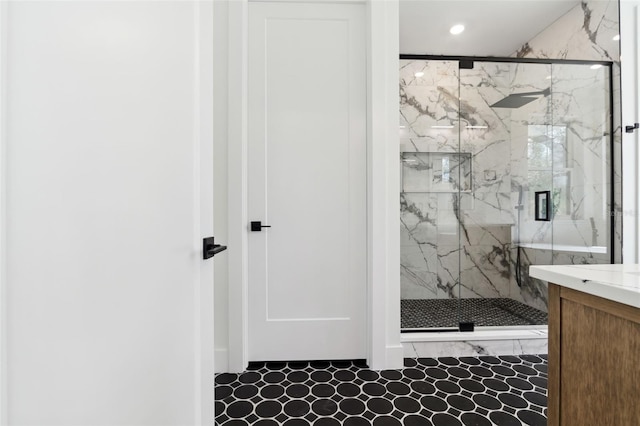 bathroom with an enclosed shower