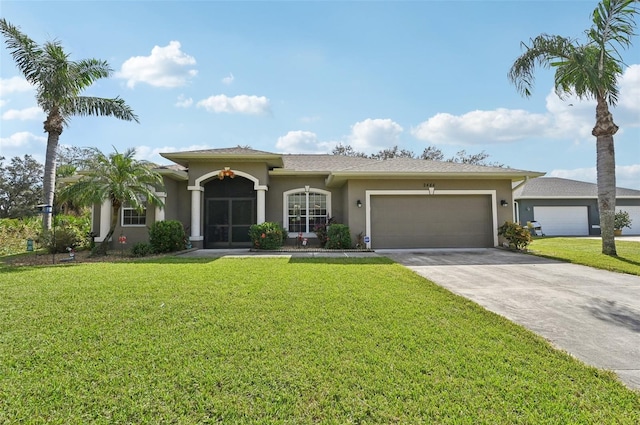 view of front of property featuring a garage and a front lawn