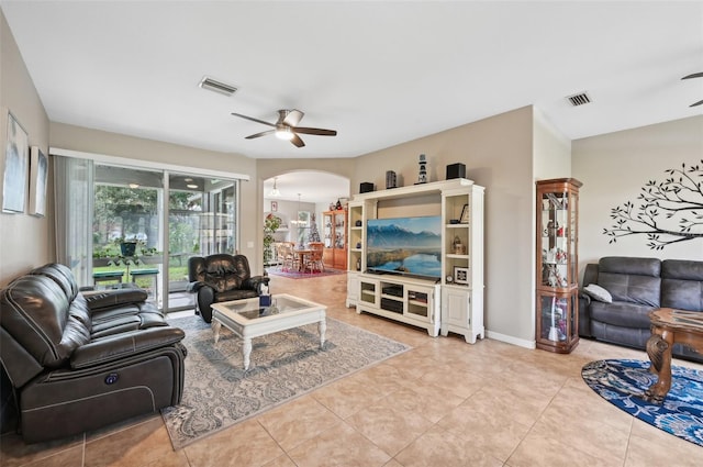 living room featuring ceiling fan and light tile patterned floors