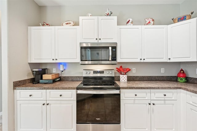 kitchen with white cabinets and stainless steel appliances