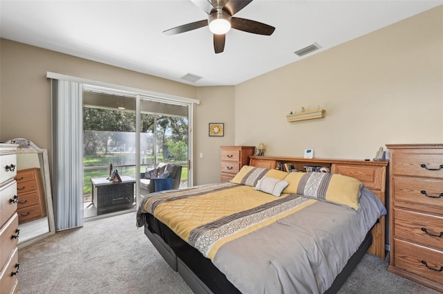 carpeted bedroom featuring access to outside and ceiling fan