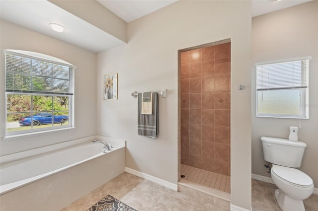 bathroom featuring toilet, independent shower and bath, and tile patterned flooring