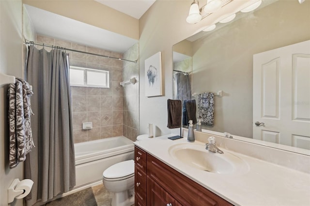 full bathroom with vanity, toilet, and shower / bath combo with shower curtain