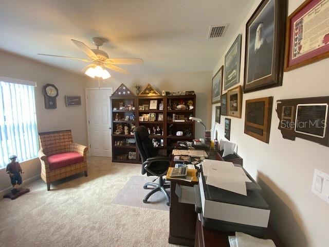 office with light colored carpet and ceiling fan