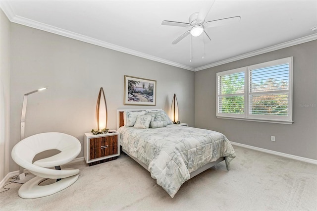 bedroom featuring ceiling fan, carpet floors, and crown molding