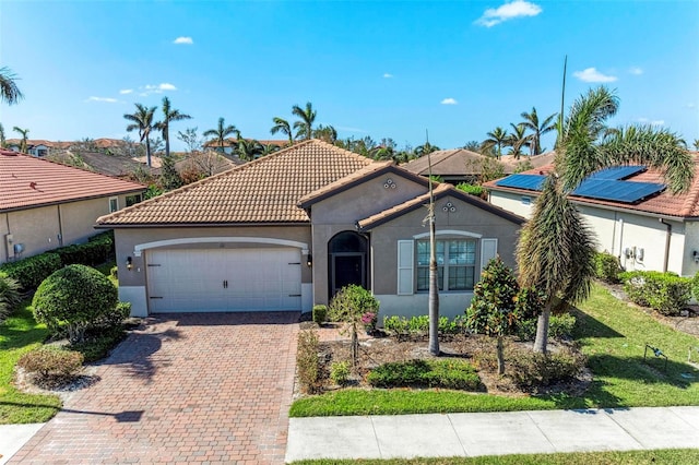 view of front of house with a garage