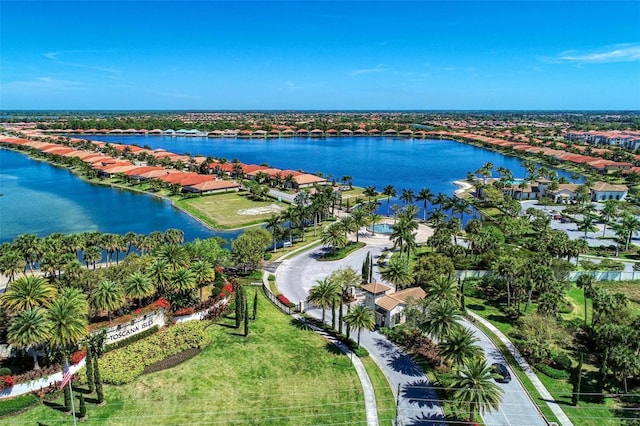 birds eye view of property featuring a water view