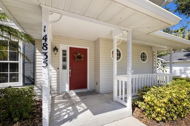 entrance to property with covered porch