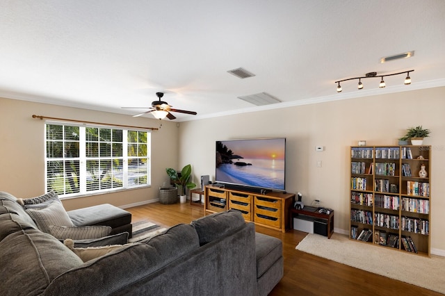 living room with ceiling fan, crown molding, and hardwood / wood-style floors