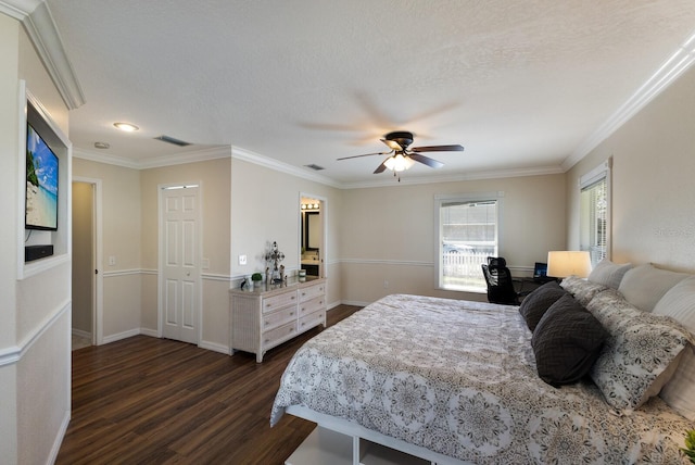 bedroom with dark hardwood / wood-style flooring, crown molding, a textured ceiling, and ceiling fan