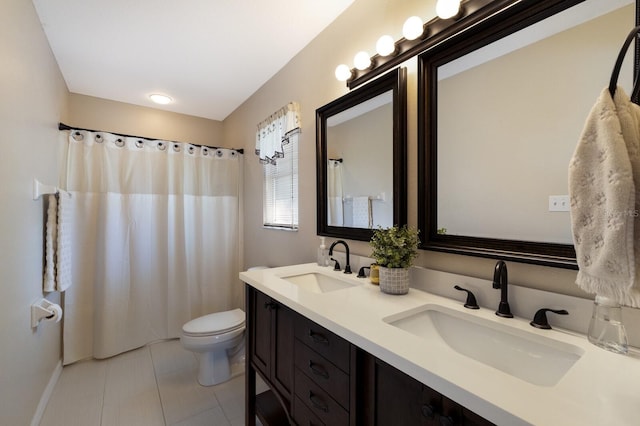 bathroom featuring vanity, toilet, walk in shower, and tile patterned flooring