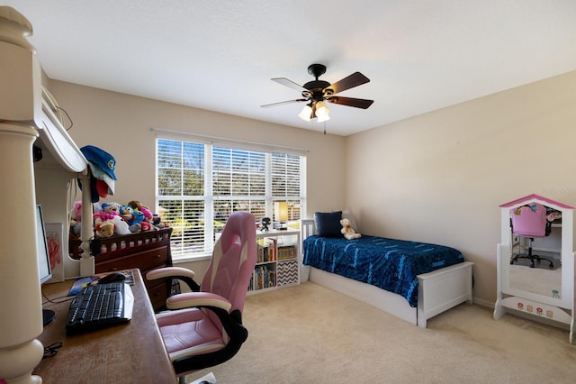 bedroom with light carpet and ceiling fan