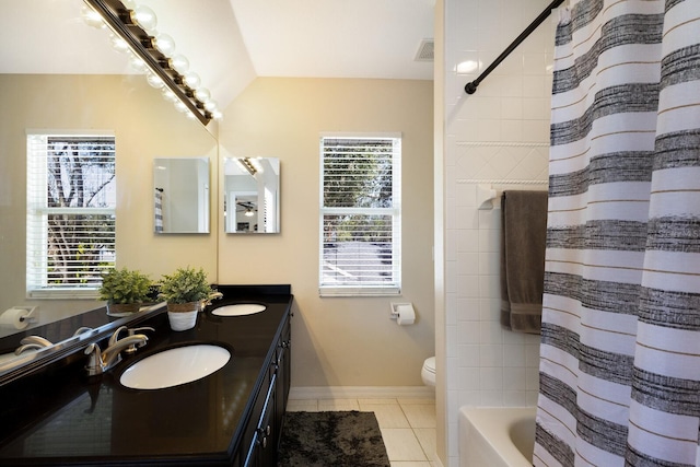 full bathroom with toilet, tile patterned flooring, vaulted ceiling, vanity, and shower / bathtub combination with curtain