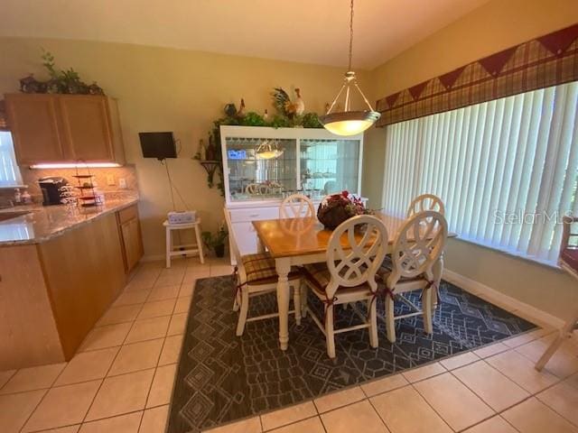 view of tiled dining space