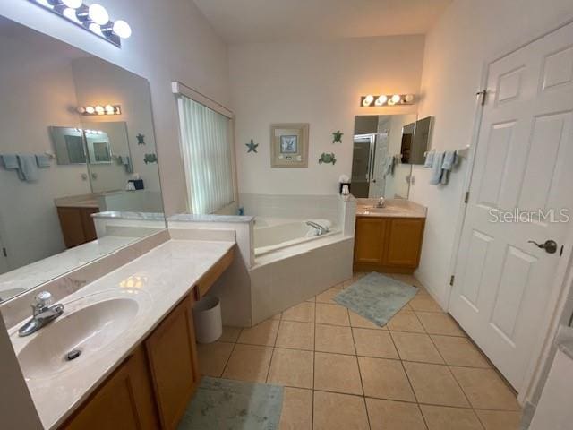 bathroom featuring vanity, separate shower and tub, and tile patterned floors