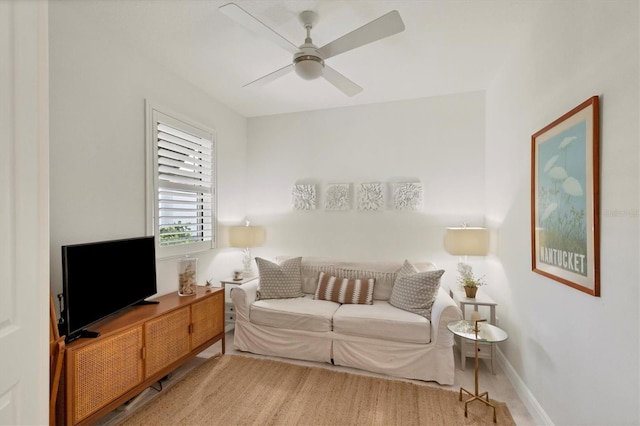 living room featuring ceiling fan